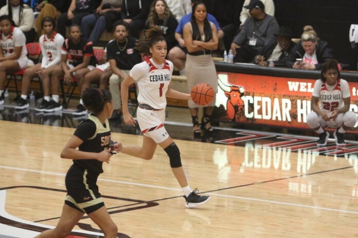 Cedar Hill girls basketball player dribbling