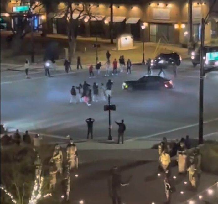 street intersection with black car