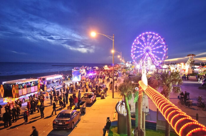 Ferris wheel on beachfront at night