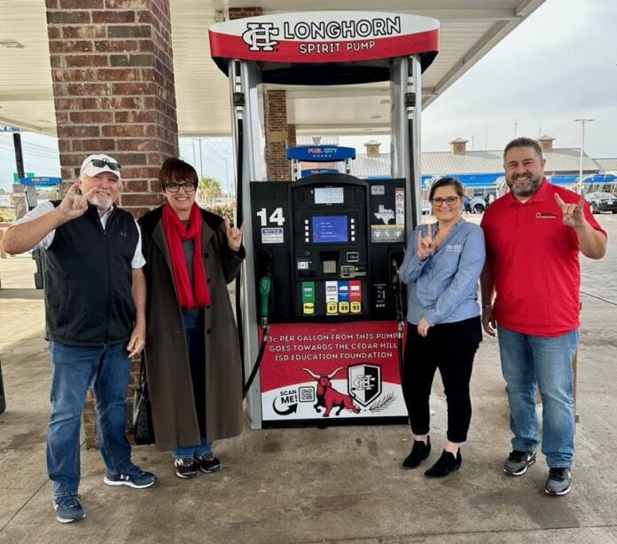 adults standing beside fuel pump