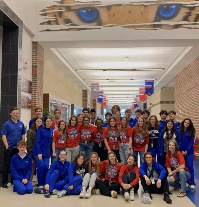 male and female swim team members MISD