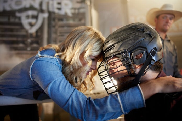 woman embracing man with helmet