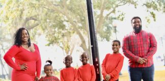 Rising Family Is Grateful For Sense of Community in Cedar Hill ISD four kids and two adults all wearing red