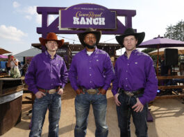 three cowboys in front of crown royal ranch sign