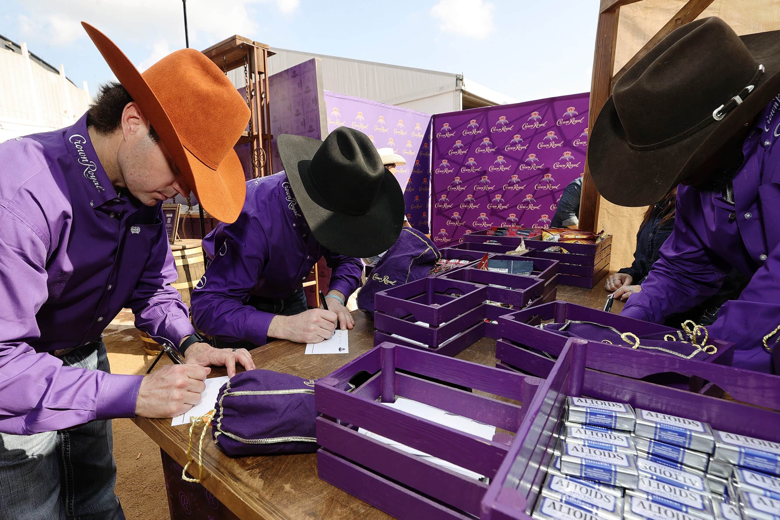 cowboys signing Crown Royal bags