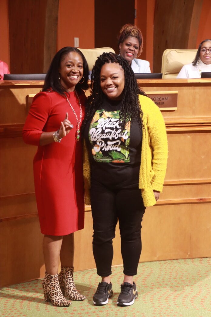 two African American ladies standing together