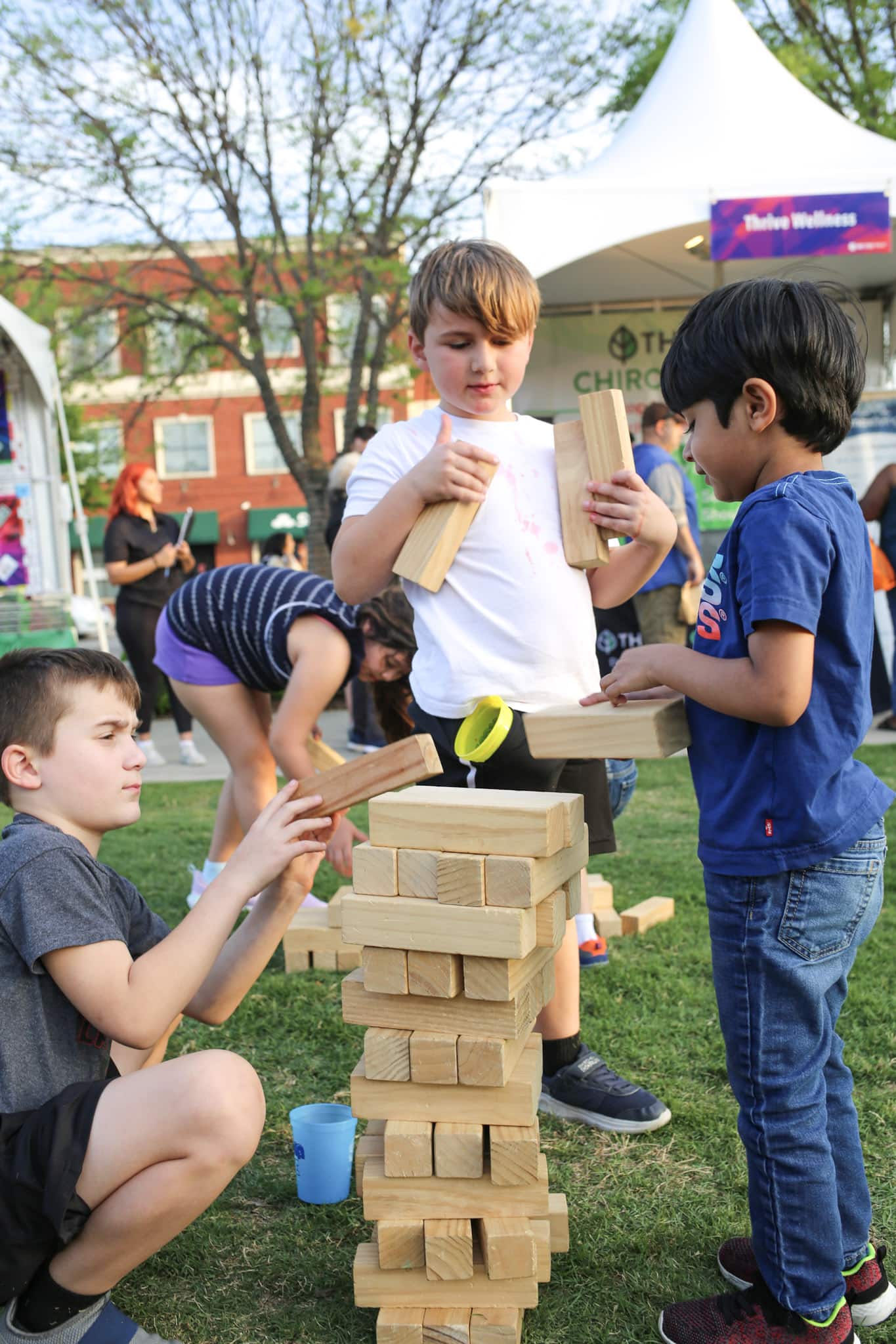 kids playing JENGA