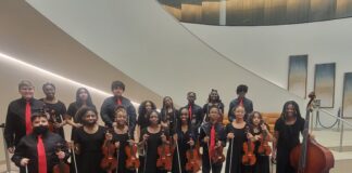 Bessie Coleman Honors Orchestra To Perform At Meyerson Hall students with orchestra instruments