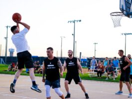 men playing basketball outside