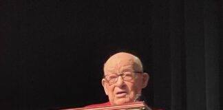 Dennis Celebrates A Century As A Cedar Hill Longhorn Raymond Dennis behind a lectern