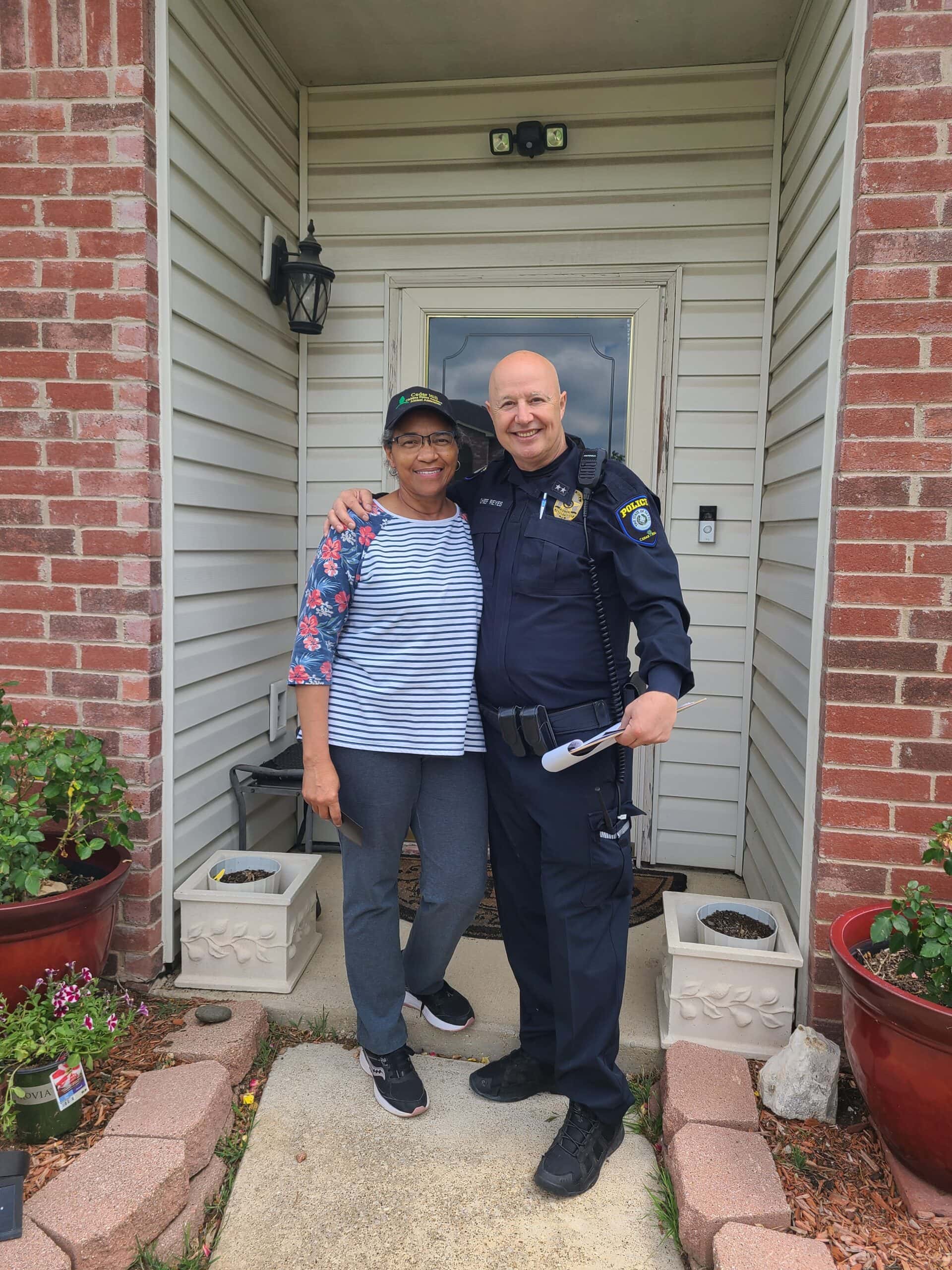Cedar Hill Police Chief with local resident