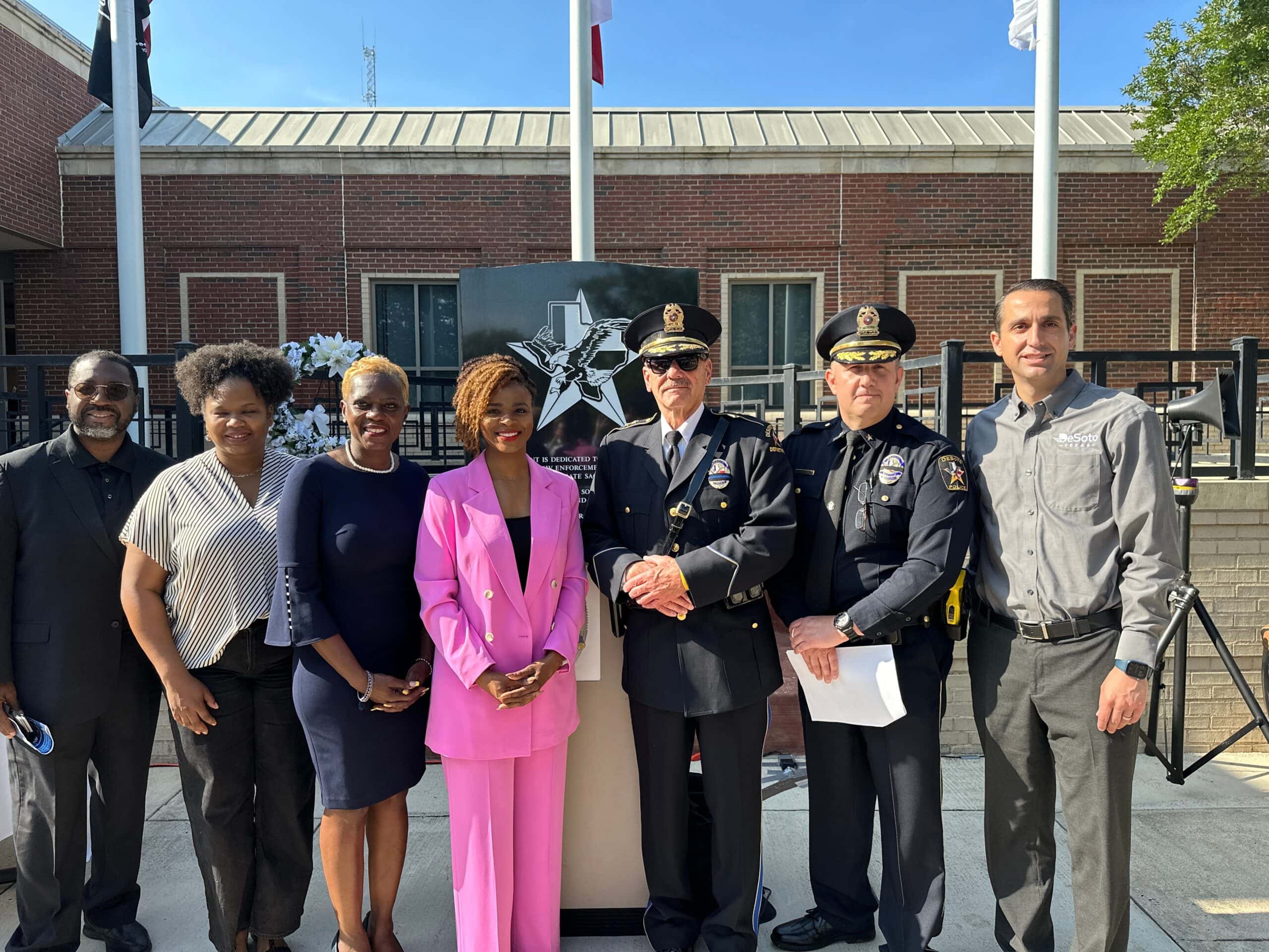 City of DeSoto officials with Police Chief at fallen officer memorial