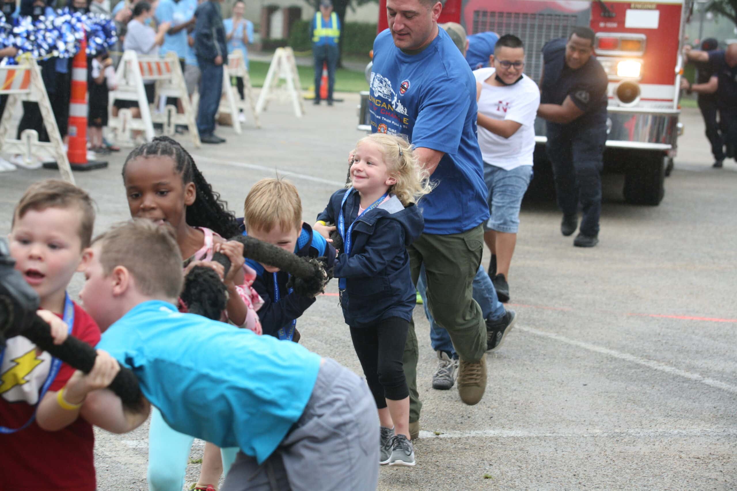 Kids help at Fire Truck Pull