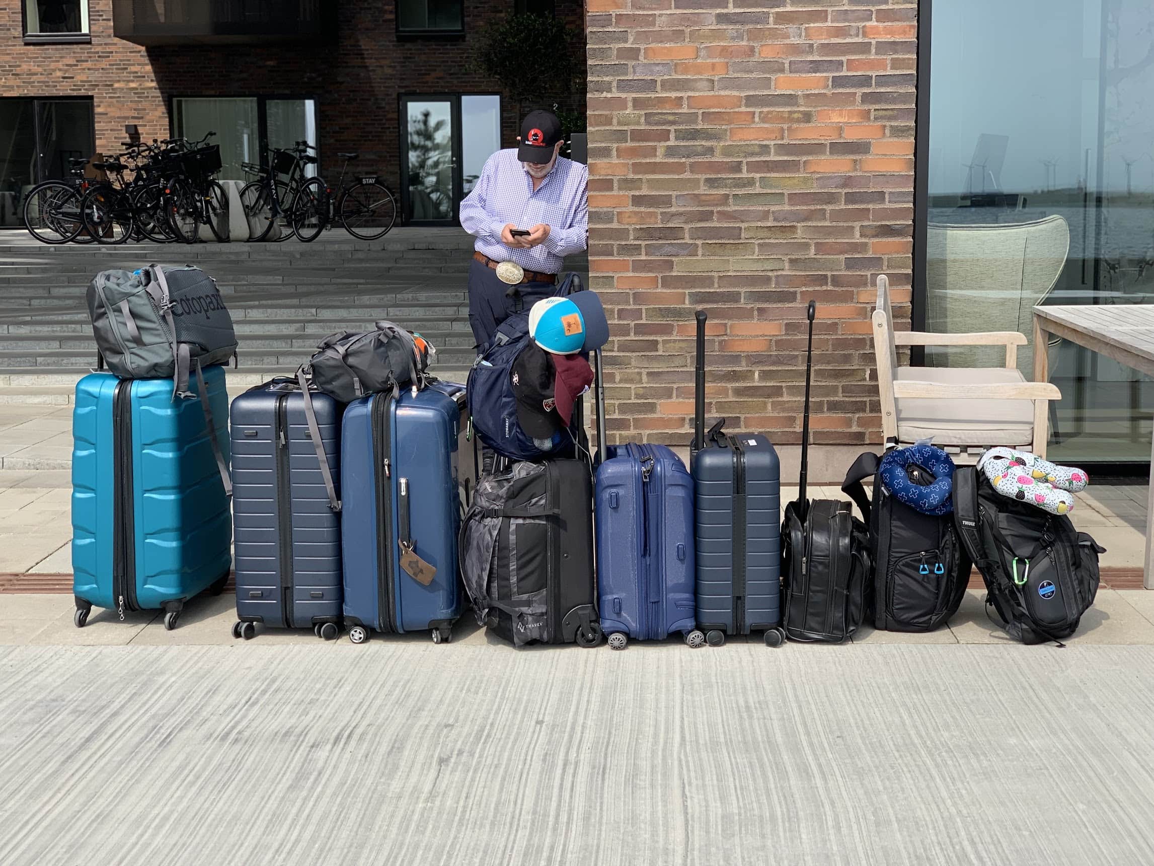 A row of different suitcases and bags