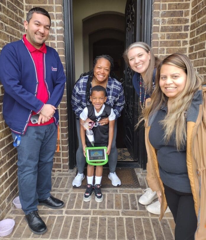 parents with kids on doorstep