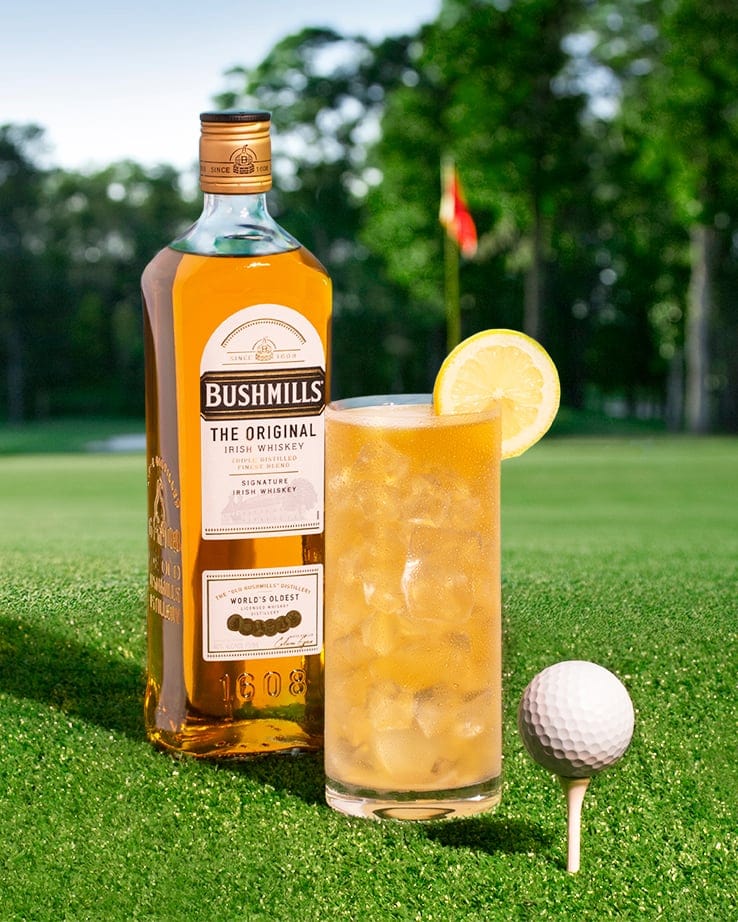 Bushmills with cocktail and golf tee