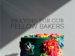 cake on pedestal with text