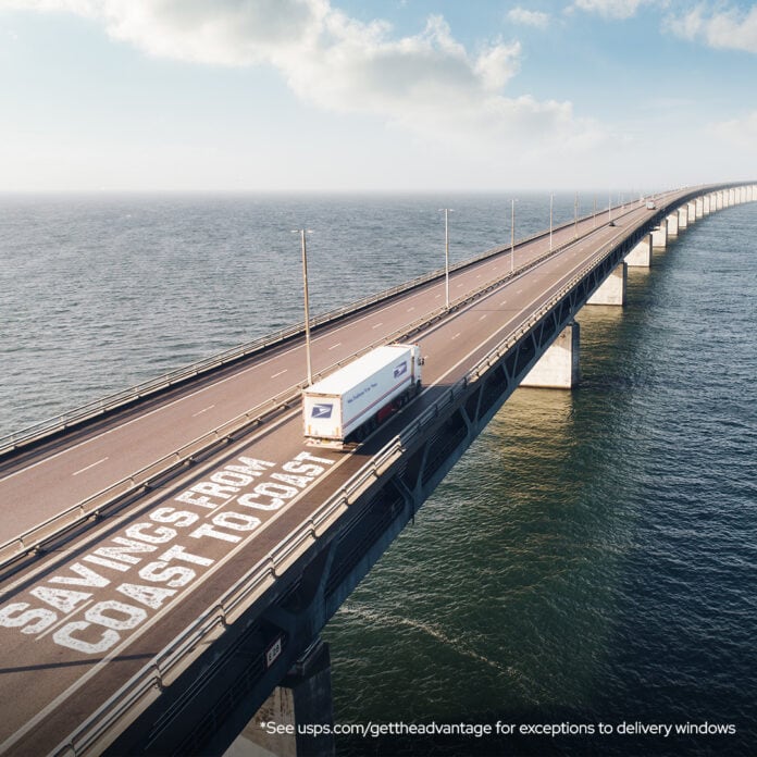 USPS truck on a bridge