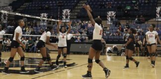 2023 Cedar Hill Volleyball Team Expects Excellence cedar hill volleyball player's action shot