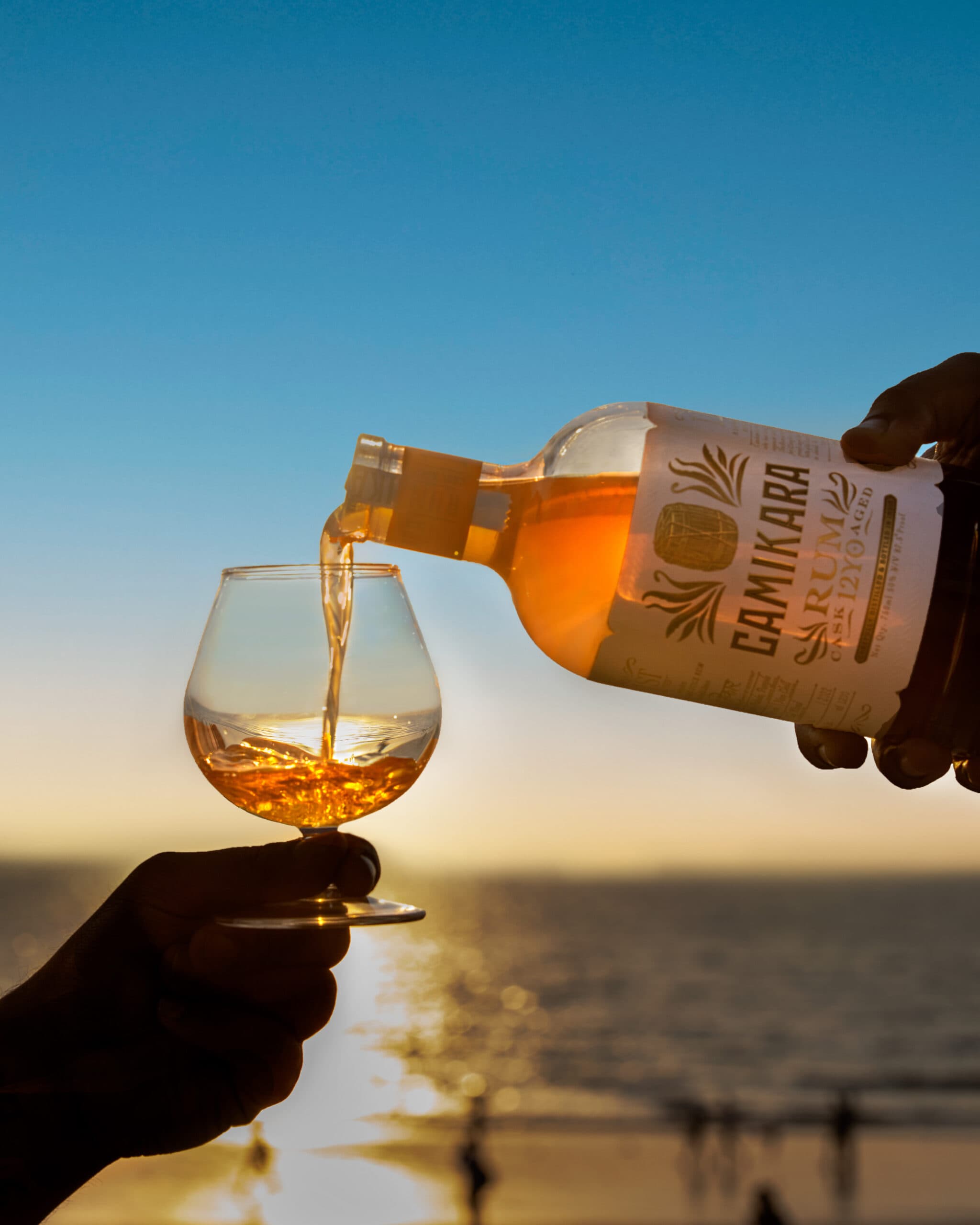 Camikara rum pouring into glass