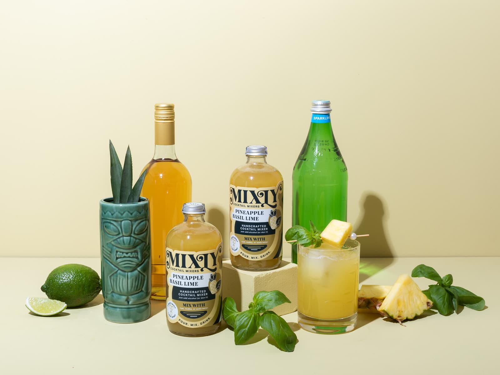 Mixly mixer bottles with tiki glass