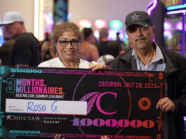 Rosa Guia with cardboard check