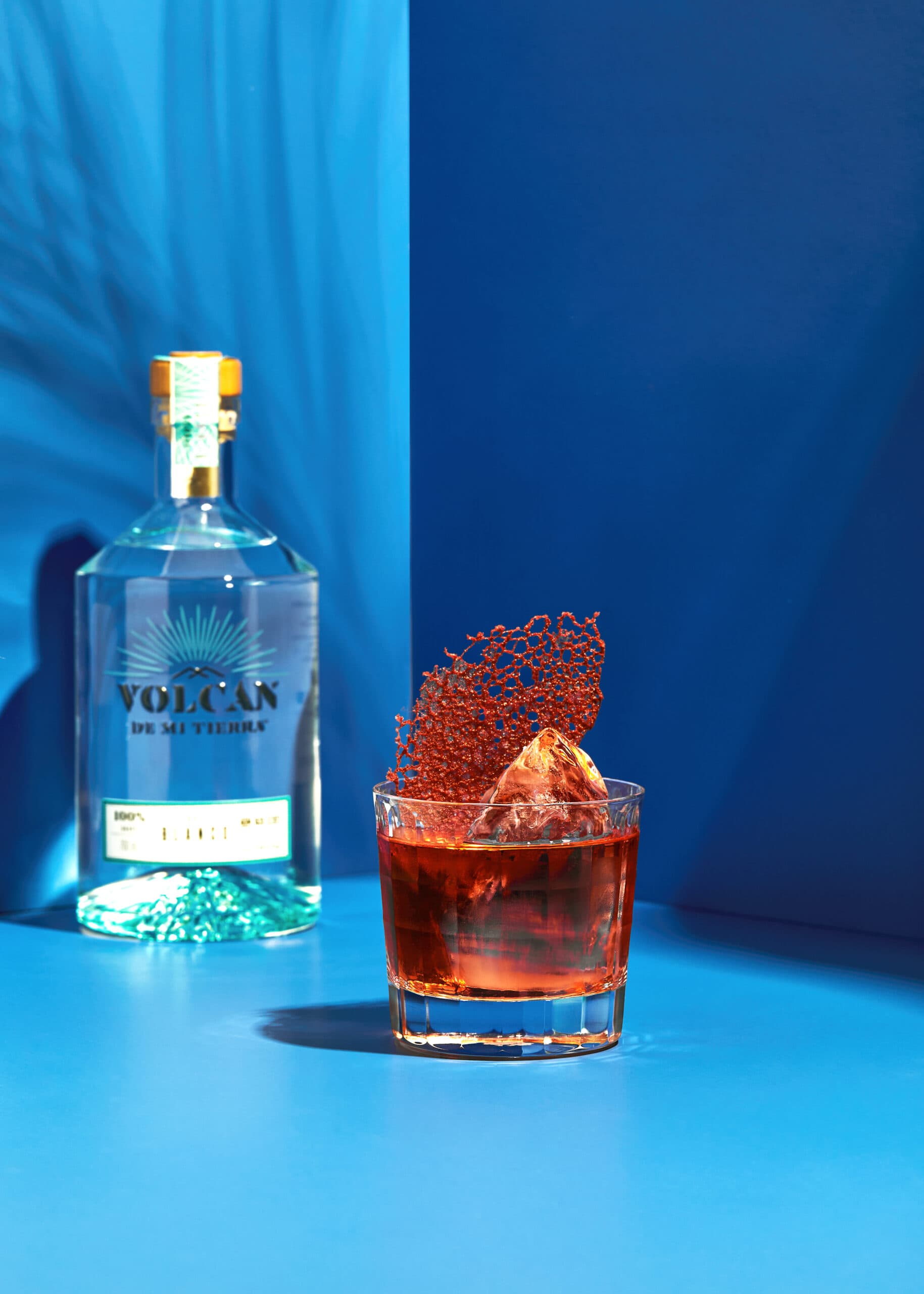 Mexican negroni with Volcan tequila bottle