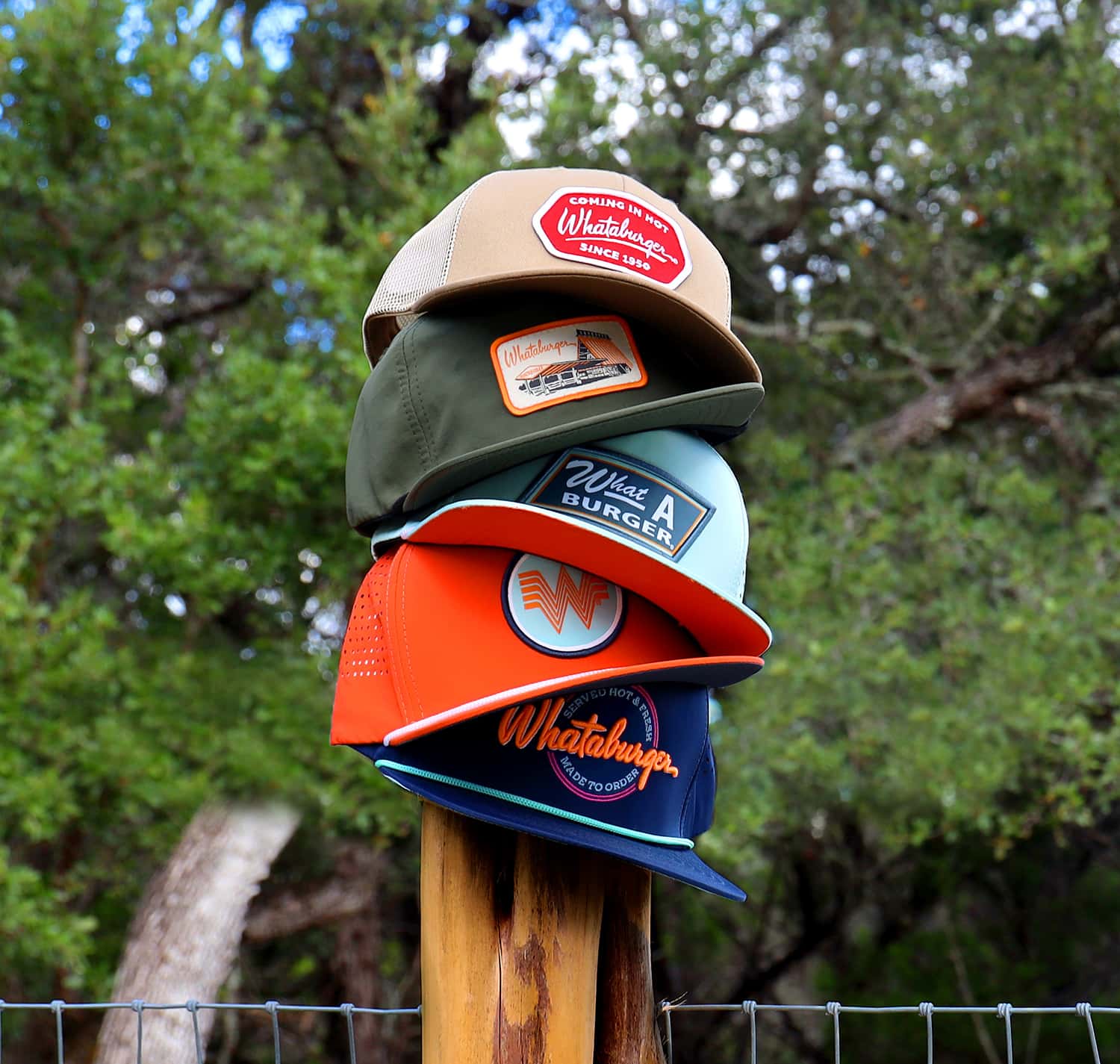 Whataburger hats stacked
