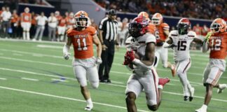 Cedar Hill Football Builds Confidence for 2023 Season Cedar Hill football player running