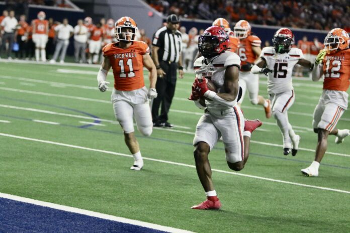 Cedar Hill football player running