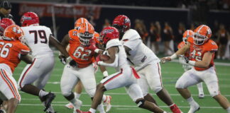 Cedar Hill Football to Kick Off 2023 Season vs. Rockwall at The Star Cedar Hill football players action shot