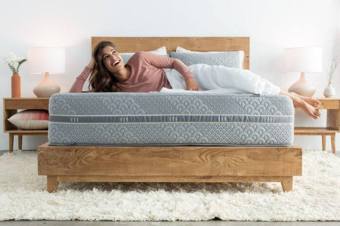 Brentwood home mattress with woman lying on it