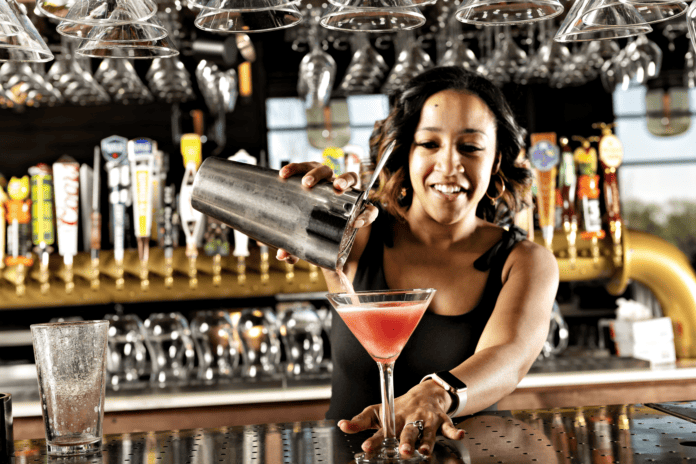 bartender pouring martini