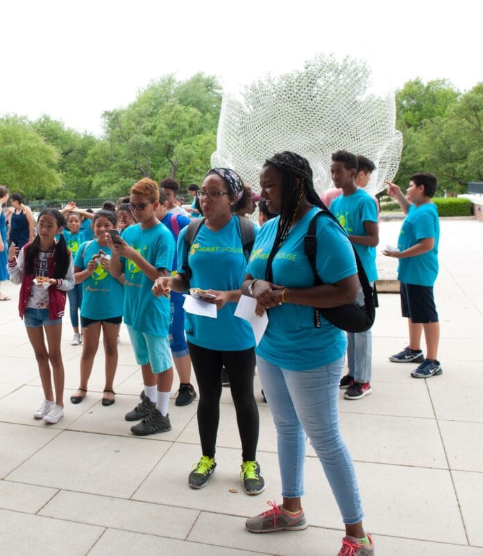 students wearing blue shirts