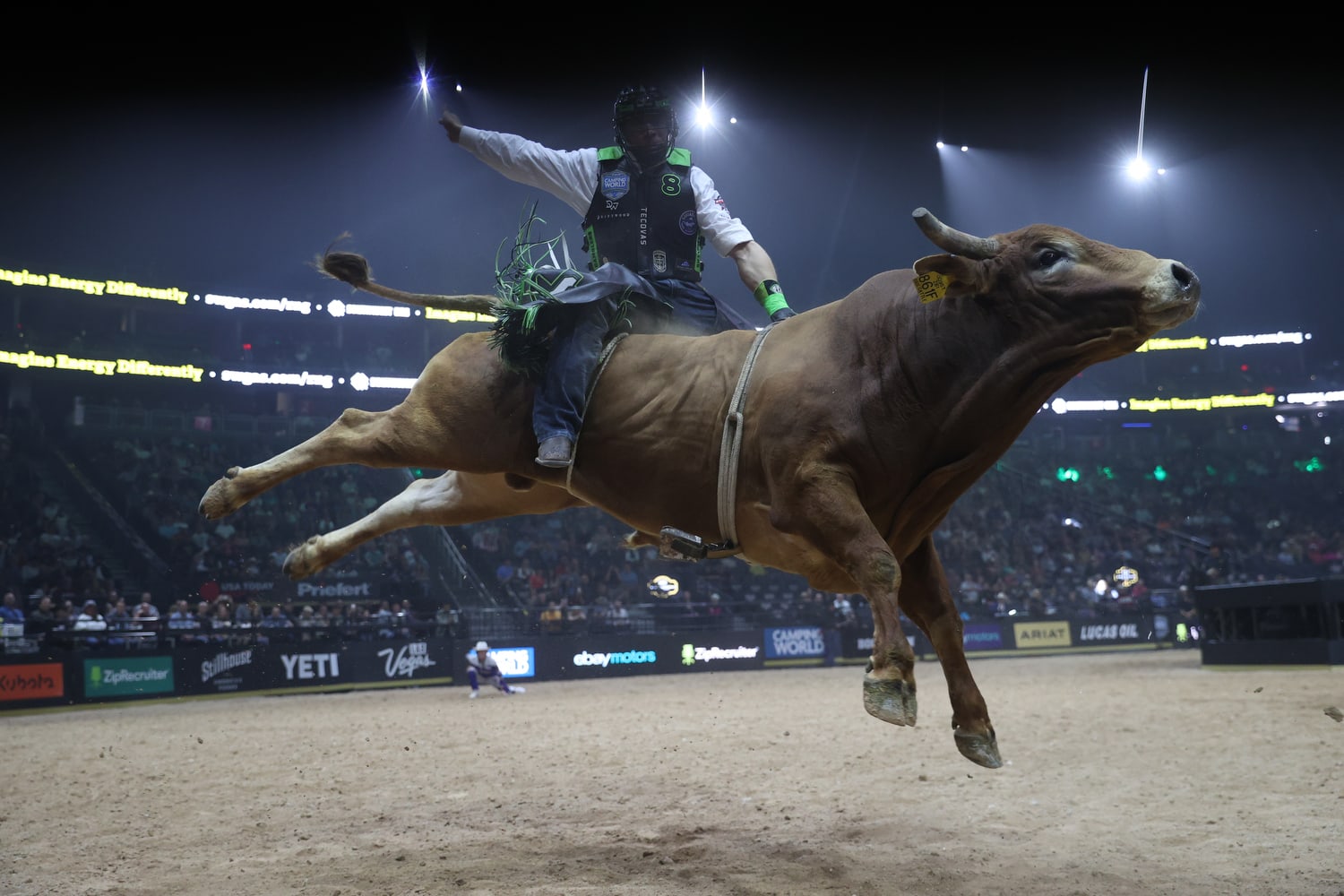 cowboy riding bull midair