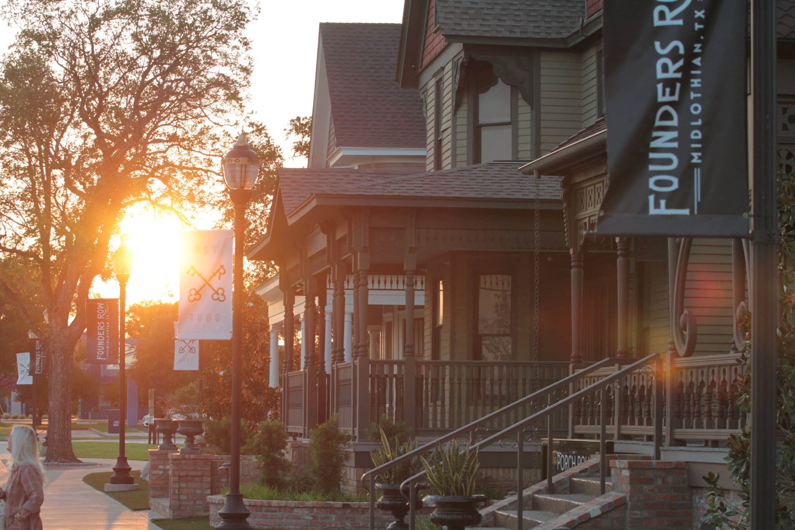 Founders Row homes with sun setting
