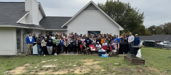 group of people outside of Midlothian home