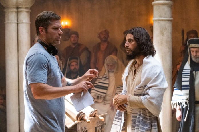 S3 BTS still - Director Dallas Jenkins and Jesus discuss scene in synagogue Director Dallas Jenkins and Jesus discuss scene in synagogue