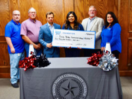 A symbolic check with Texas Trust leaders