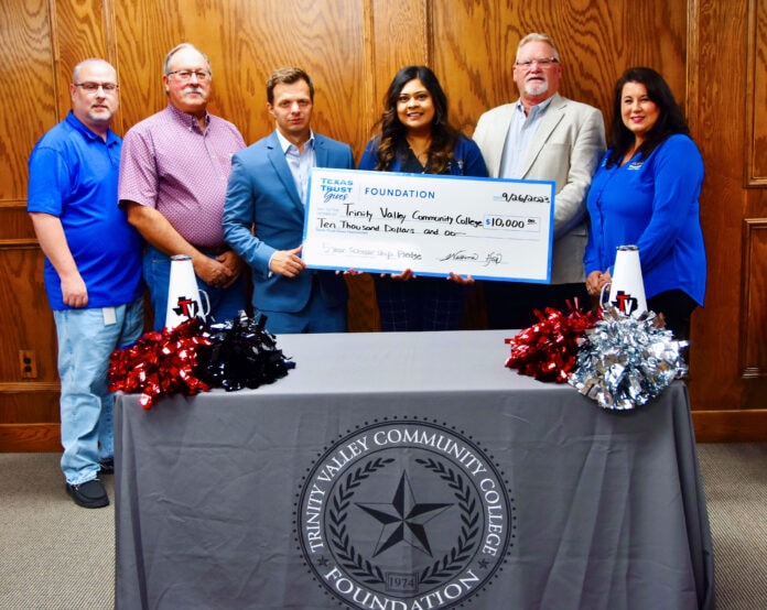 unnamed (32) A symbolic check with Texas Trust leaders