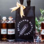 2023 Gift Guide: Impress the Bourbon Drinker On Your List With These Five Texas Bourbons Blackland Distillery whiskey bottles