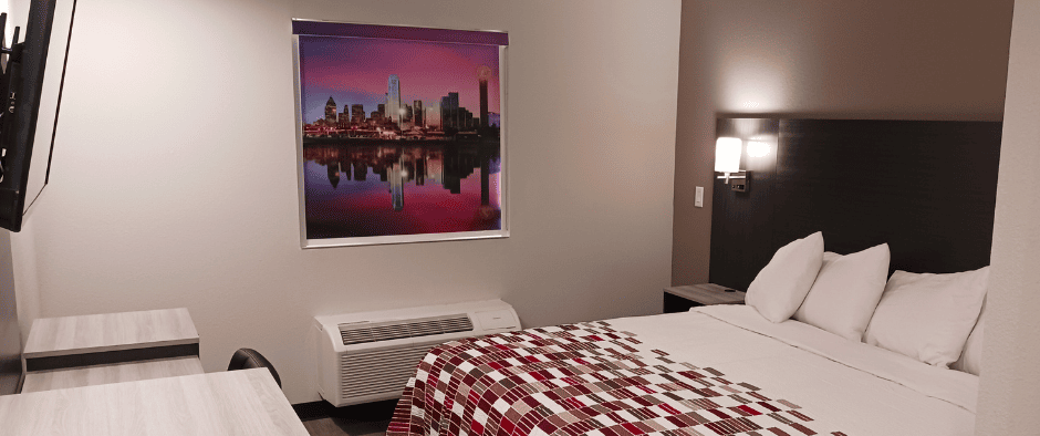 guest room with bed at Red Roof Inn