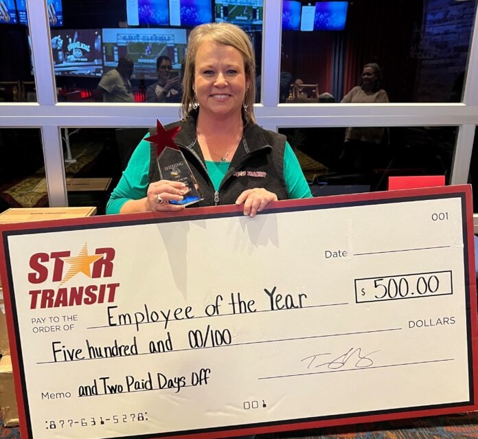Teresa Elliot with cardboard check from STar TRansit