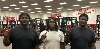 Cedar Hill High School Football Triplets Propel Longhorns to Impressive Season Performance three black male athletes that are triplets