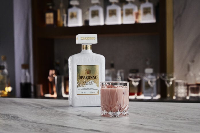 Disaronno velvet bottle with pink cocktail