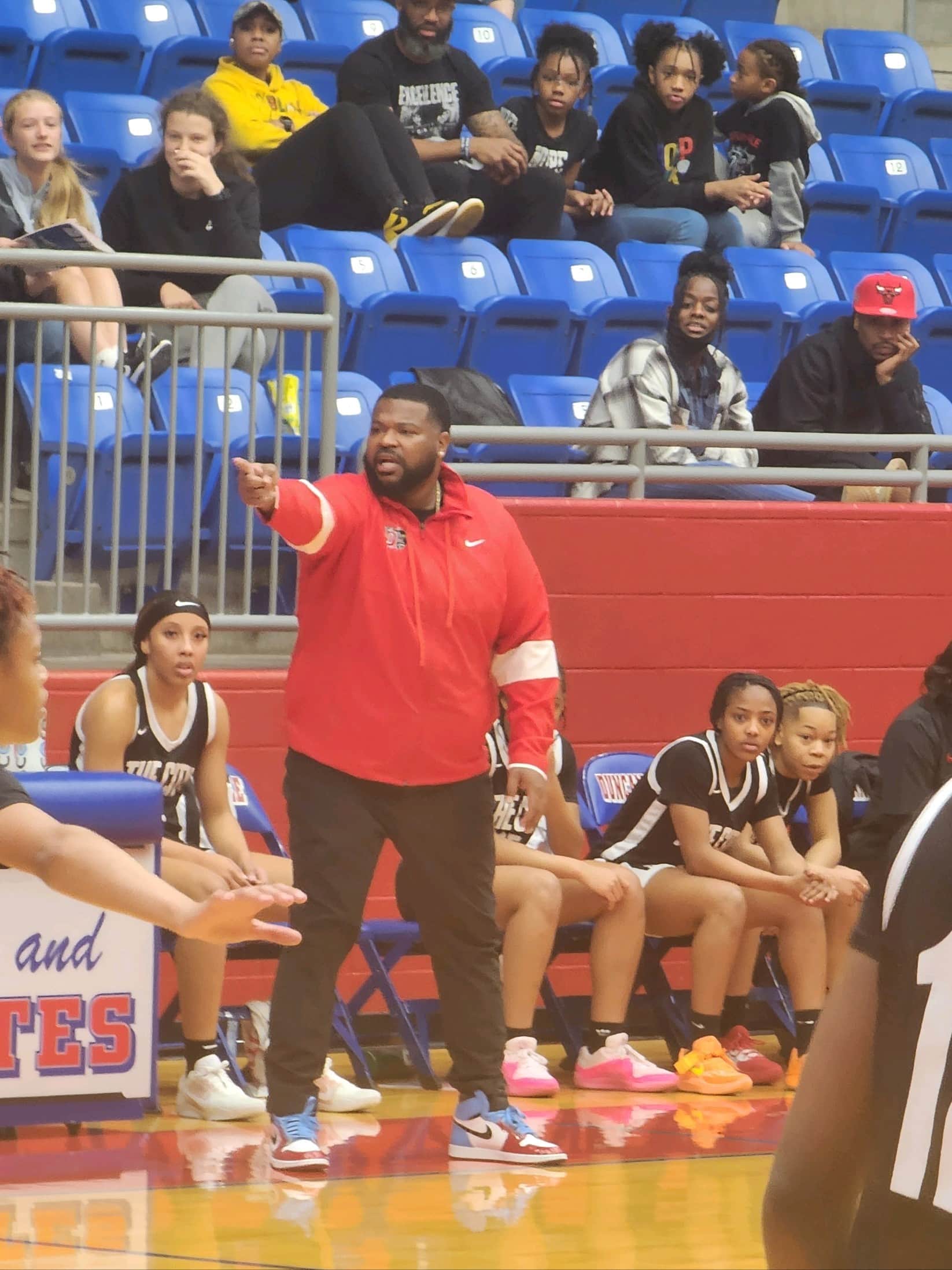 Coach Ford coaching from the sidelines