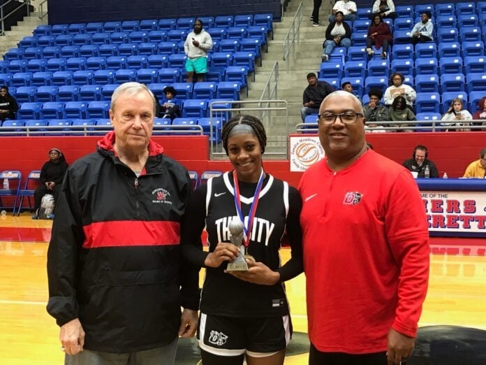 Meadows legendary boys coach Phil McNeely with all tourne MVP Meadows classic