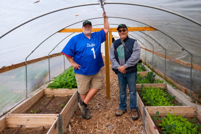 Owen Lynch and Doric Earle at Restorative Farms's Hatcher Farm site.