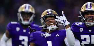 DeSoto Football Dominates with Back-to-Back State Titles, Coach Claude Mathis Named Coach of the Year, and Former Players Shine in College Championships Jabbar Muhammed in University of Washington photo