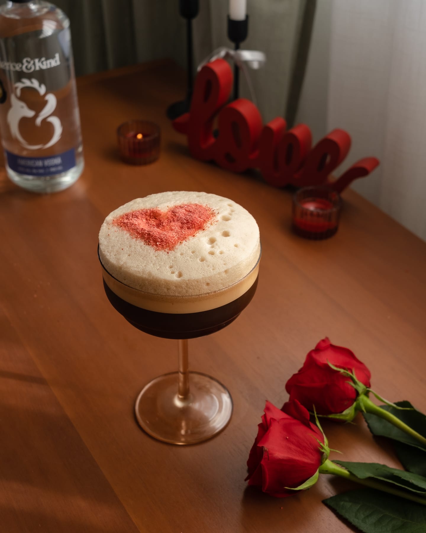 red heart in foam of espresso martini